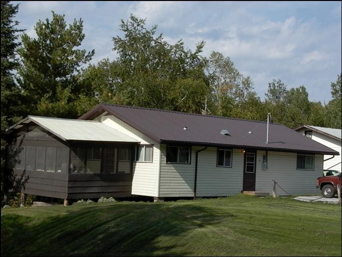 A cabin with a spacious yard
