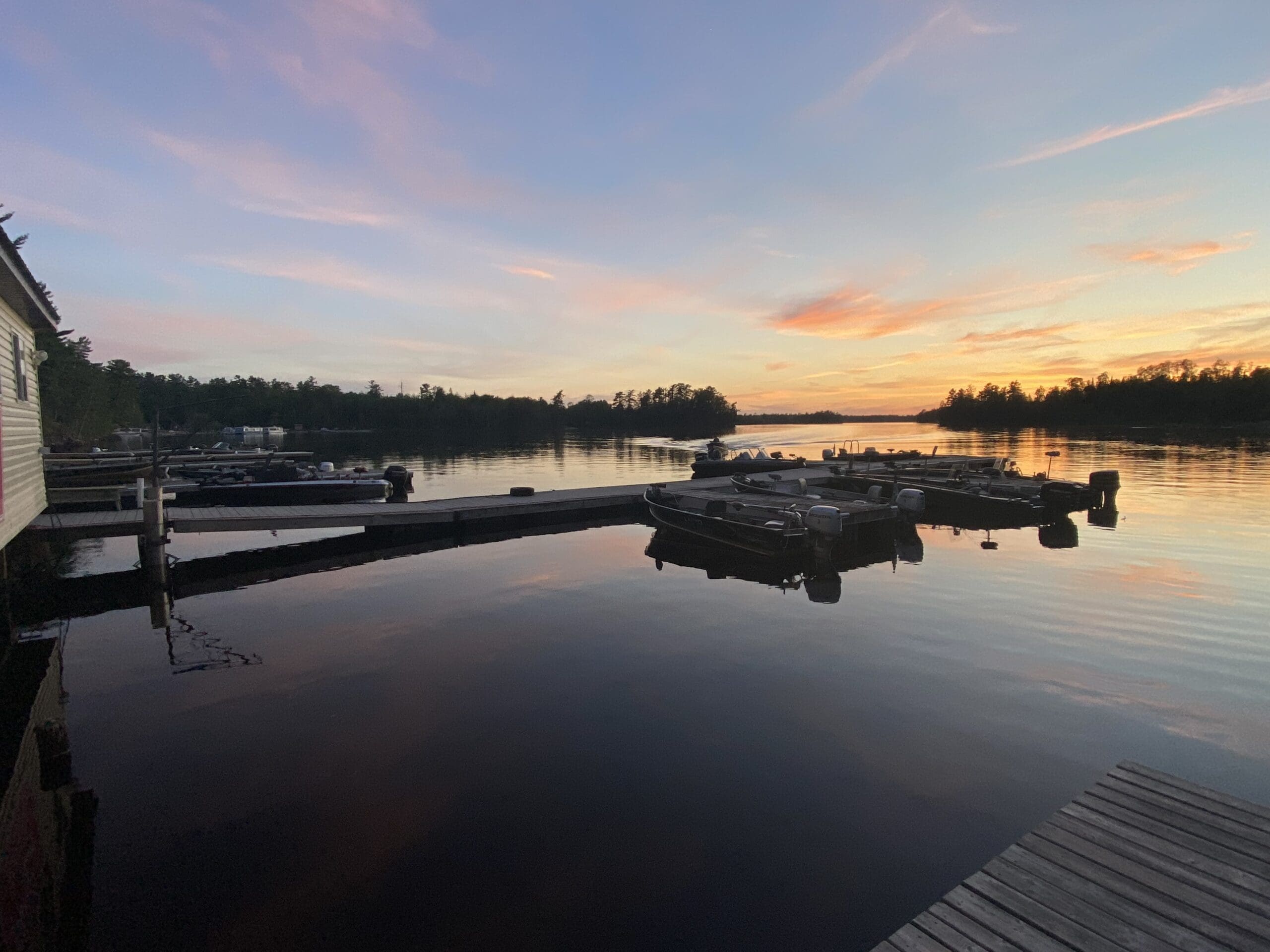 A beautiful sunset reflecting vibrant colors in calm water